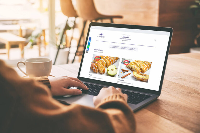 Person at their laptop viewing a Butter Braid Pastry fundraiser's online store.